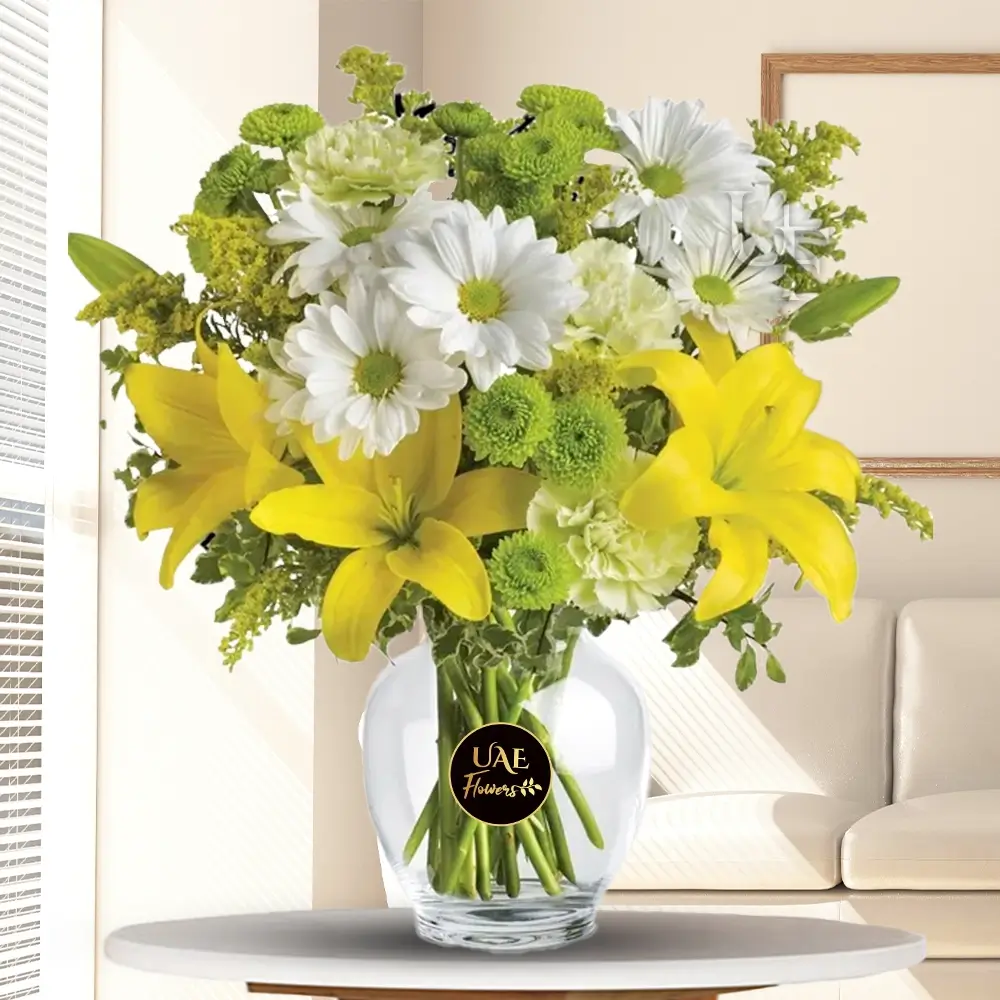 2 yellow lily stems (approx 6 flowers), white chrysanthemums, green carnations