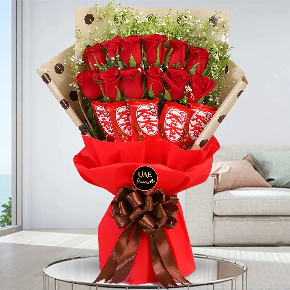12 red roses with 6 Kit Kat bars (13g) arranged in wrapping