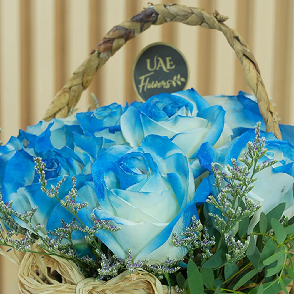 Basket of 10 blue roses with fillers