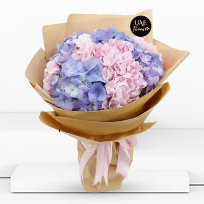 bouquet of 3 pink and 2 blue hydrangea stems with fillers