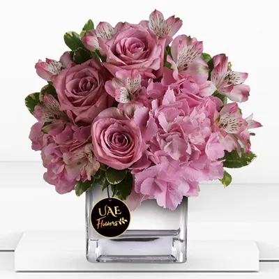2 pink hydrangeas, 4 pink roses, and 5 pink alstroemeria