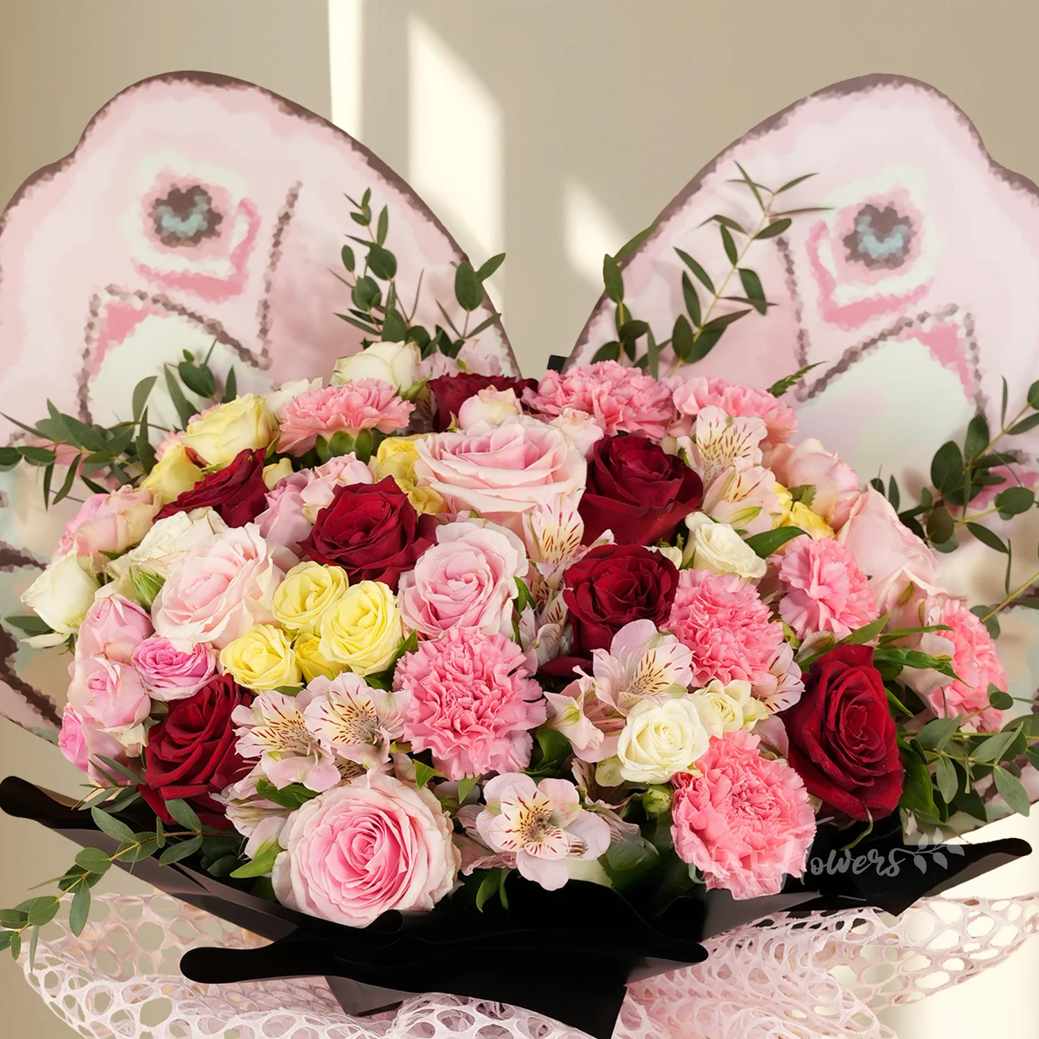 7 red roses, 5 pink roses, 8 pink carnations, 2 pink, 2 white, 2 yellow spray roses, 3 pink alstroemerias