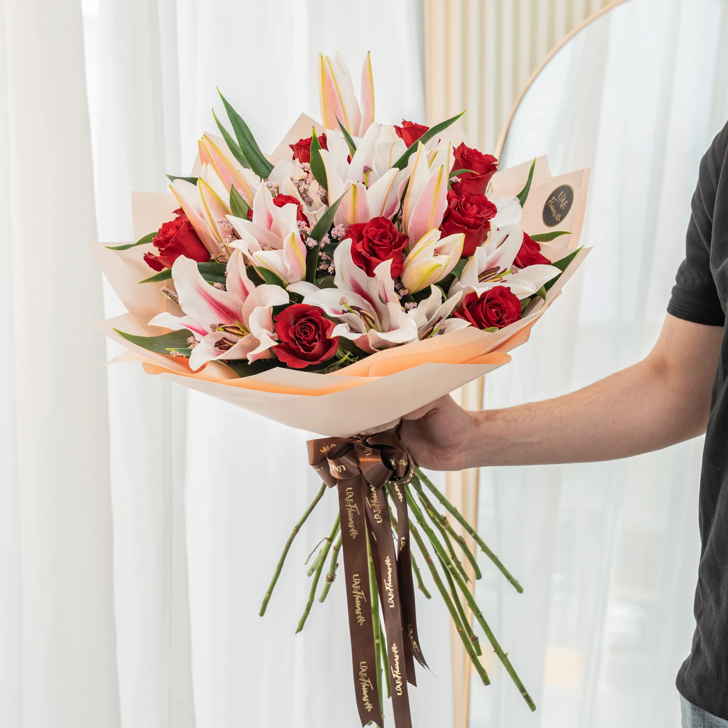 red roses, pink stargazer lilies