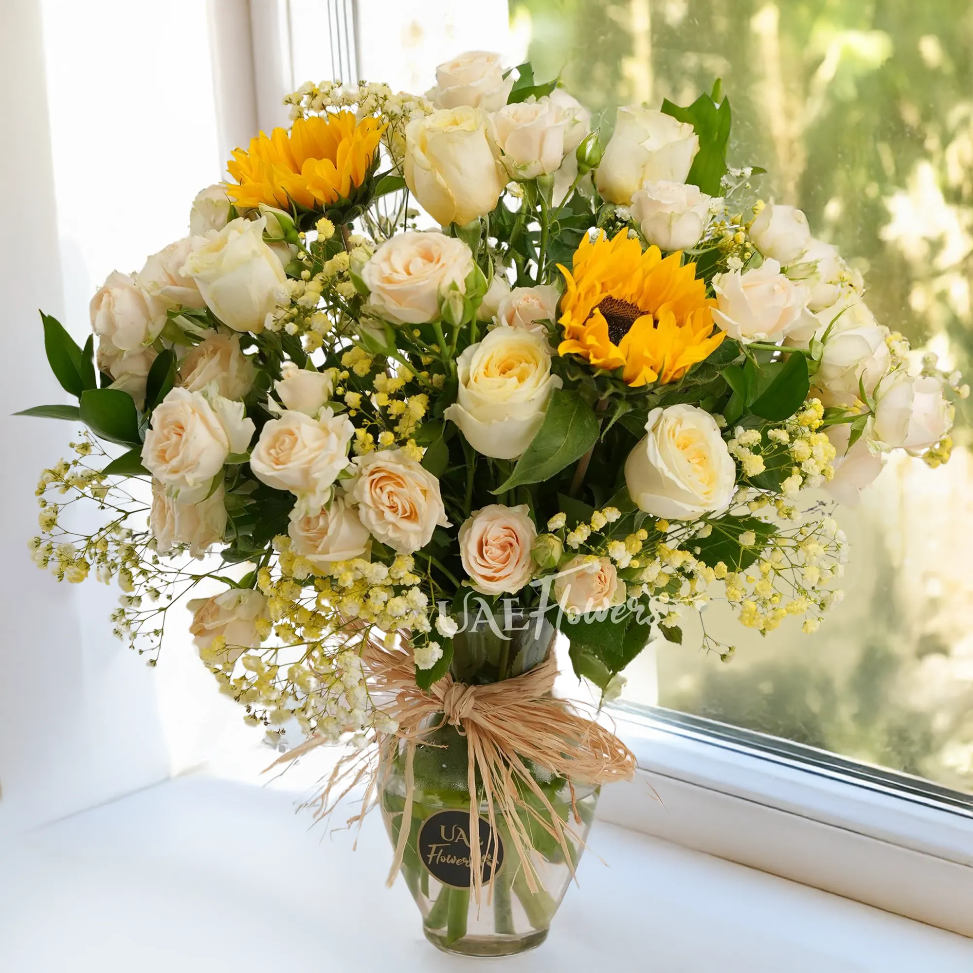 10 peach roses, 6 peach spray roses, 2 sunflowers