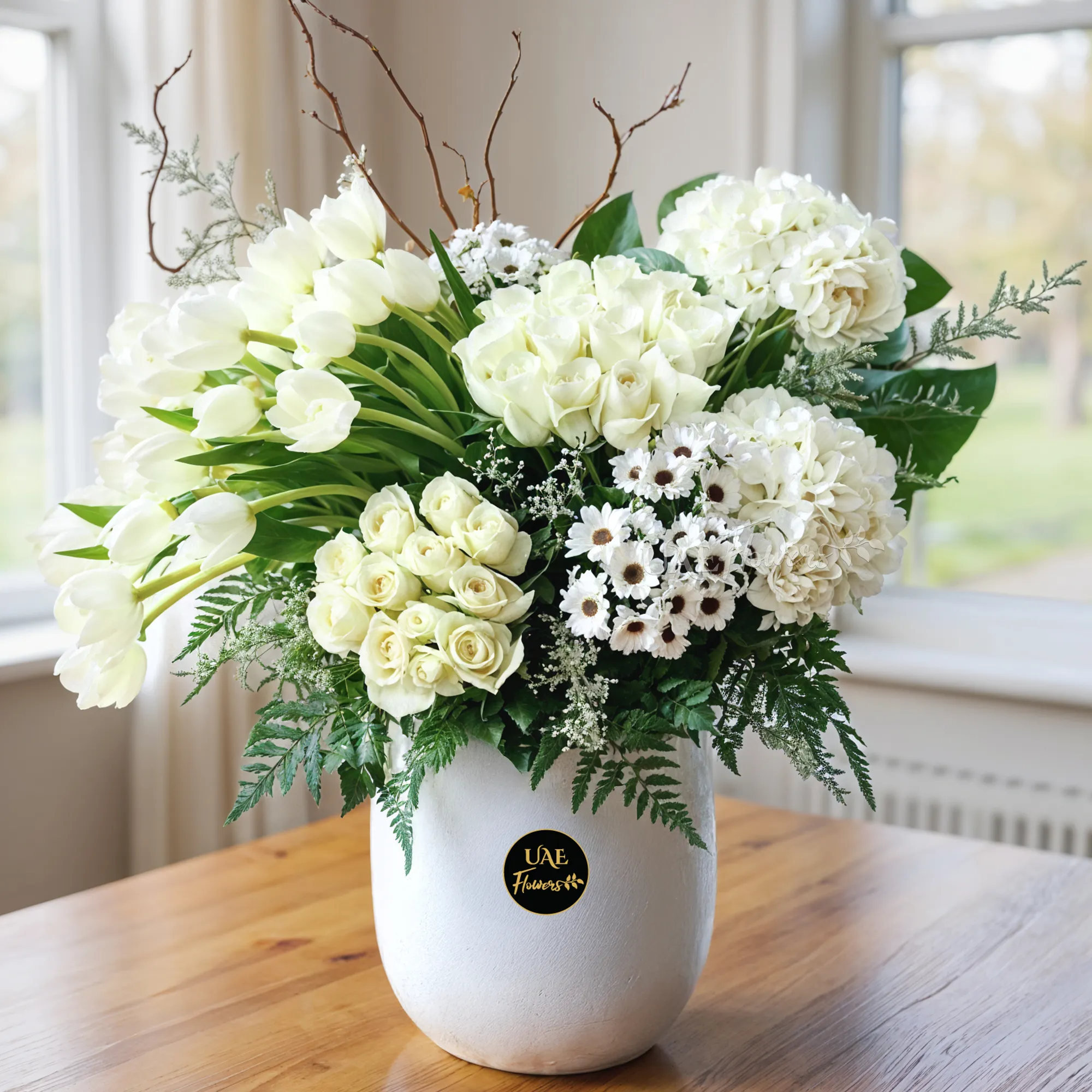 Luxurious arrangement with 24 white roses, hydrangeas, tulips, and chrysanthemums in a ceramic pot