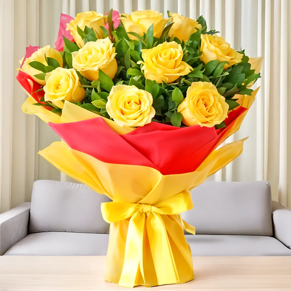 bouquet of 12 yellow roses arranged with green fillers