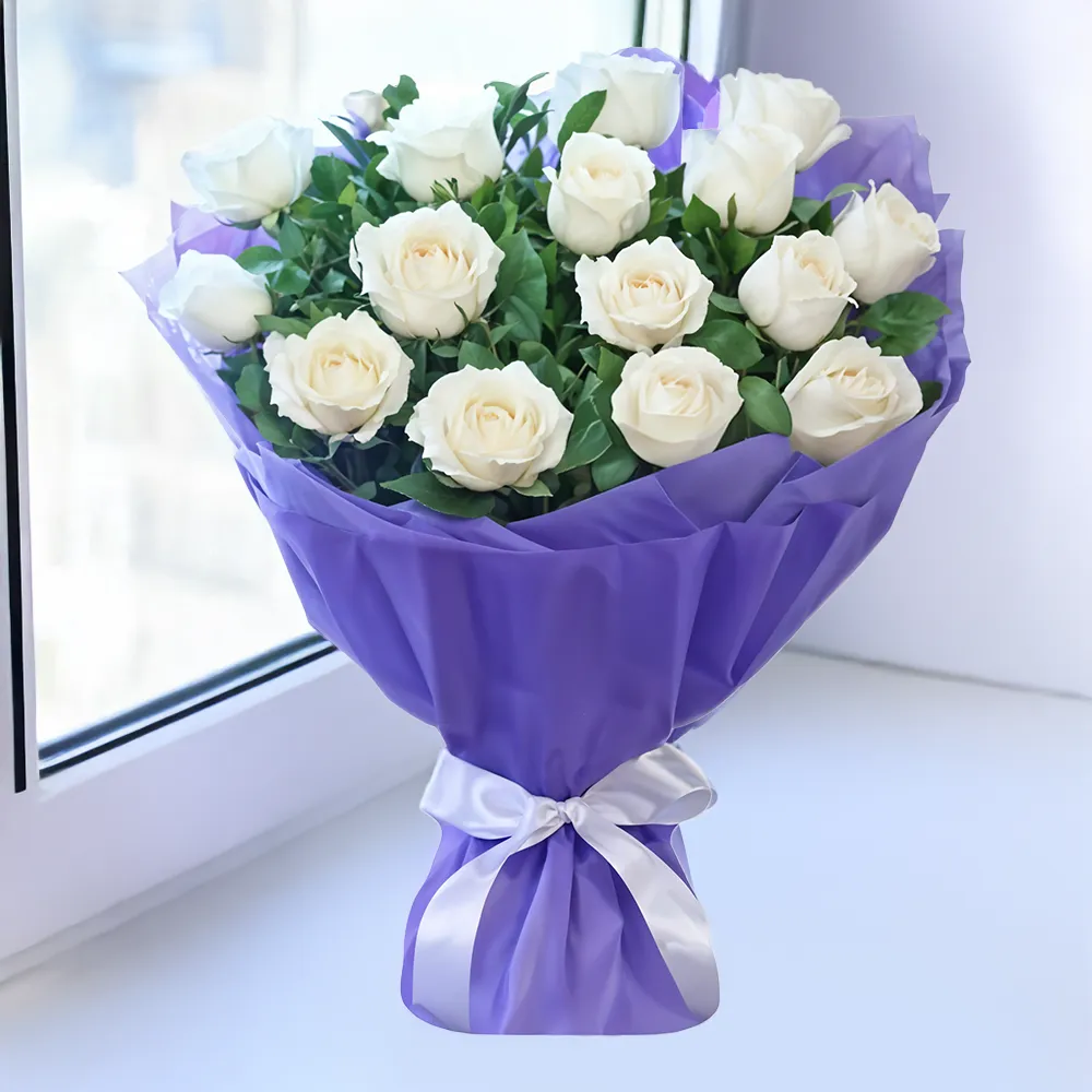 15 white roses with fillers and greens