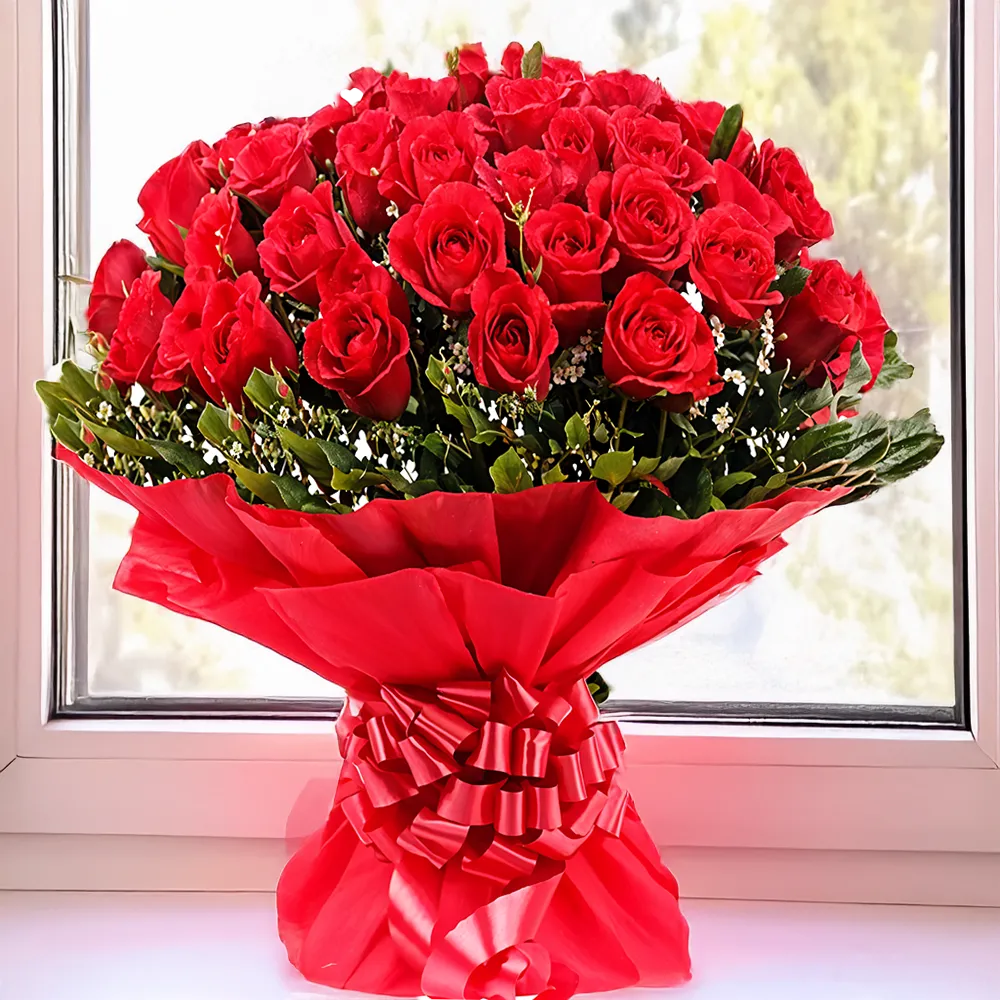 Bouquet of 50 red roses wrapped in red paper